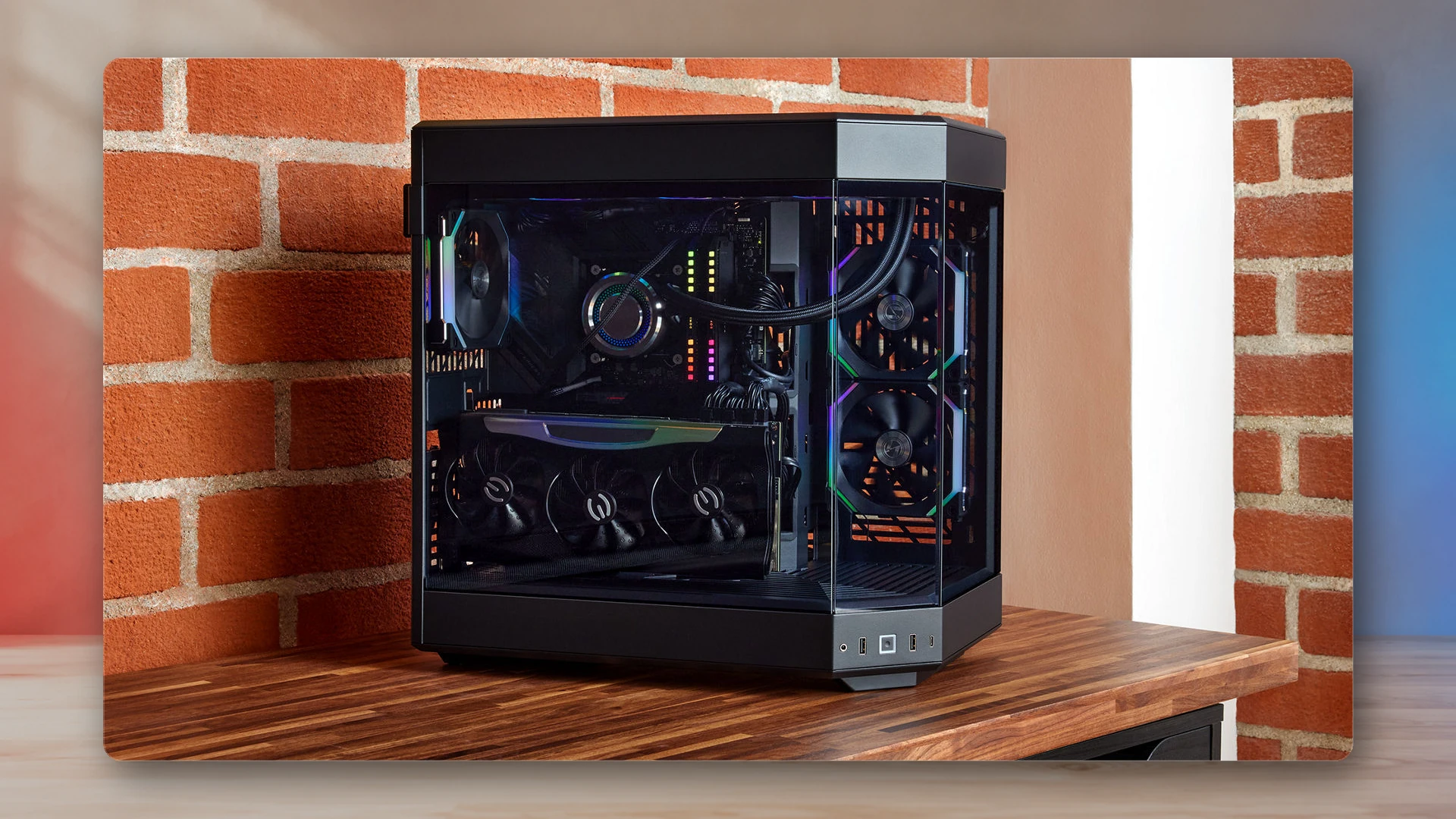 A real open gaming PC with visible components during a careful desktop build